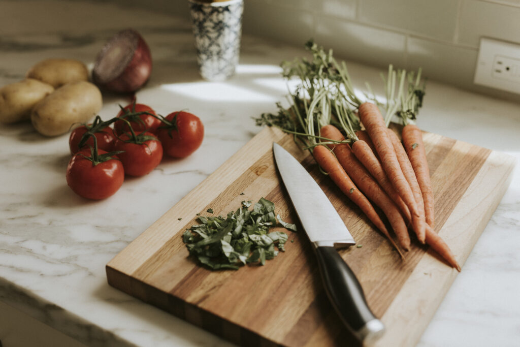 chopped vegetables and herbs for soup